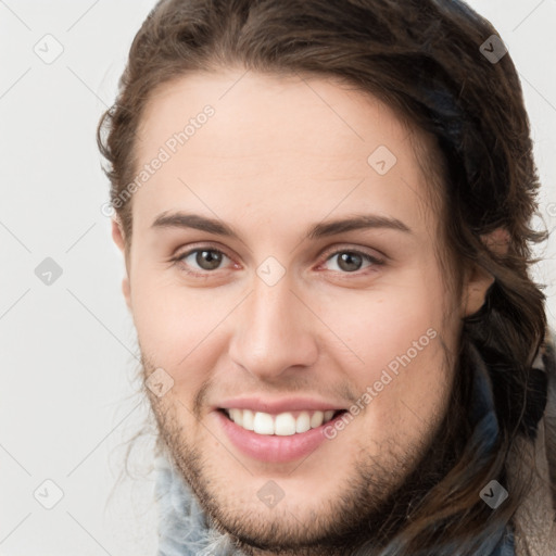 Joyful white young-adult female with long  brown hair and grey eyes