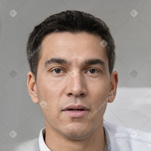 Neutral white young-adult male with short  black hair and brown eyes