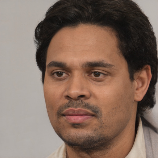 Neutral asian adult male with short  black hair and brown eyes