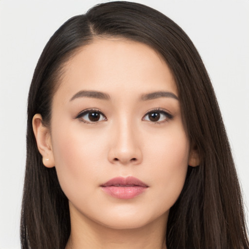 Neutral asian young-adult female with long  brown hair and brown eyes