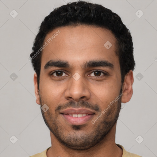 Joyful latino young-adult male with short  black hair and brown eyes