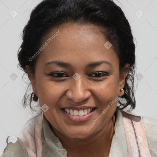 Joyful black adult female with short  brown hair and brown eyes