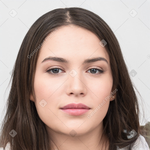 Neutral white young-adult female with long  brown hair and brown eyes