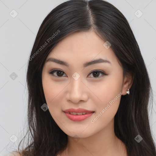 Joyful asian young-adult female with long  brown hair and brown eyes