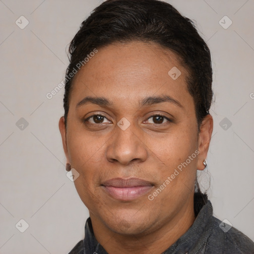 Joyful white adult female with short  black hair and brown eyes