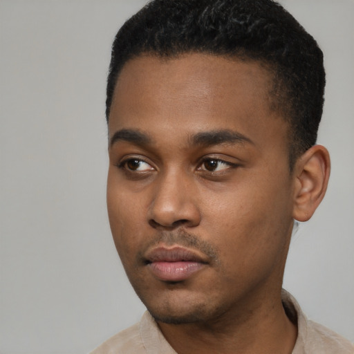 Neutral black young-adult male with short  black hair and brown eyes