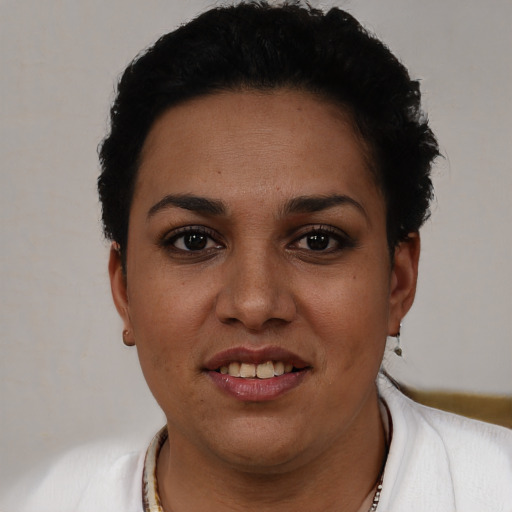 Joyful white young-adult female with short  black hair and brown eyes