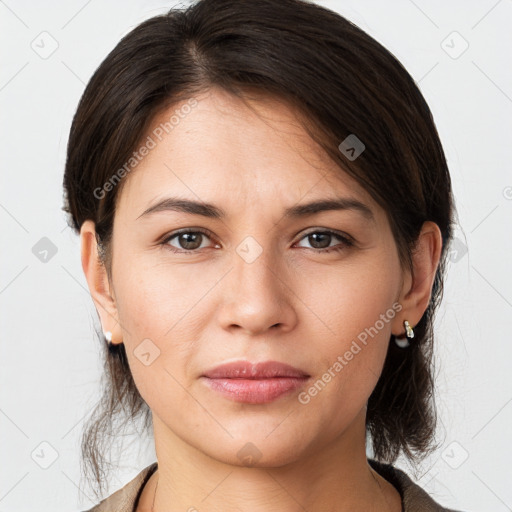 Joyful white young-adult female with medium  brown hair and brown eyes