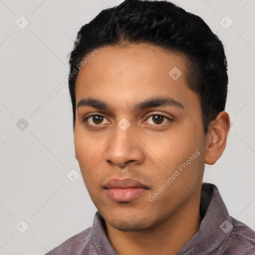 Neutral latino young-adult male with short  black hair and brown eyes