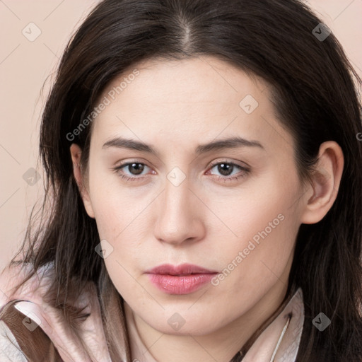 Neutral white young-adult female with long  brown hair and brown eyes