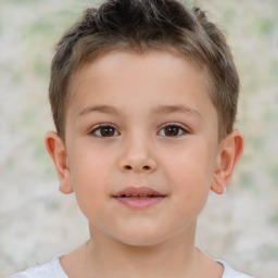 Joyful white child male with short  brown hair and brown eyes