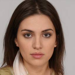 Neutral white young-adult female with medium  brown hair and brown eyes