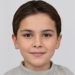 Joyful white child female with short  brown hair and brown eyes