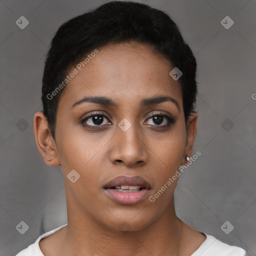 Joyful latino young-adult female with short  brown hair and brown eyes