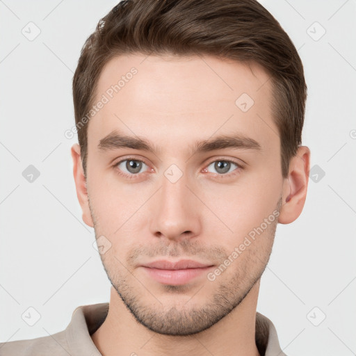 Neutral white young-adult male with short  brown hair and grey eyes