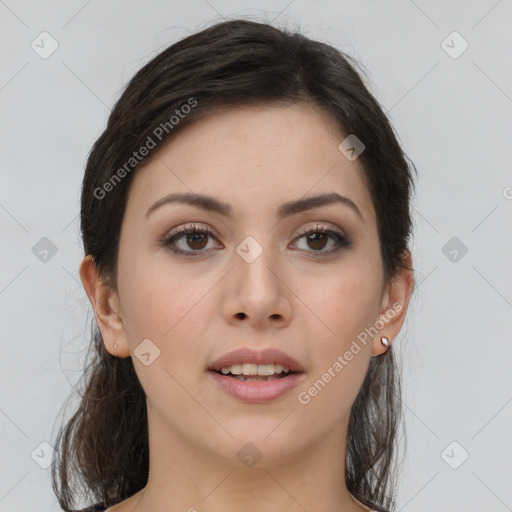 Joyful asian young-adult female with long  brown hair and brown eyes