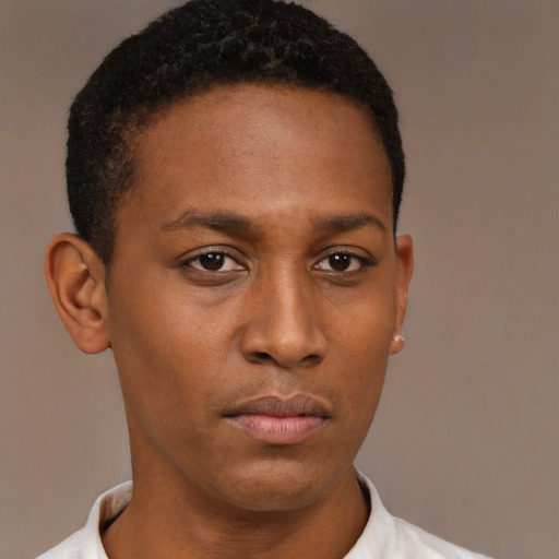 Neutral black young-adult male with short  brown hair and brown eyes