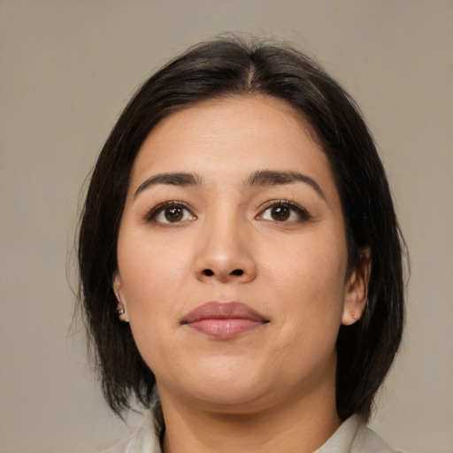 Neutral latino young-adult female with medium  brown hair and brown eyes