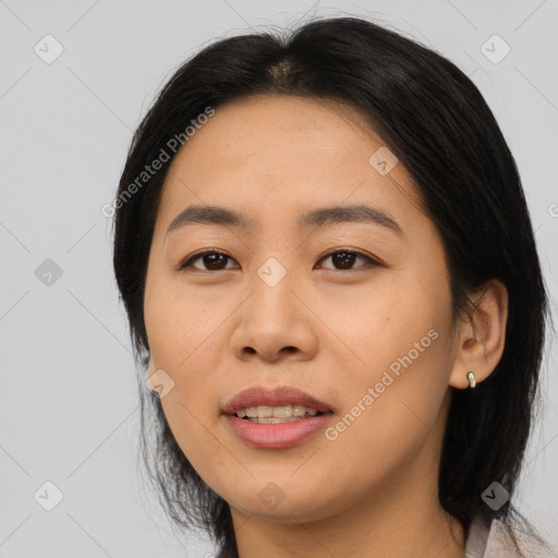 Joyful asian young-adult female with medium  brown hair and brown eyes