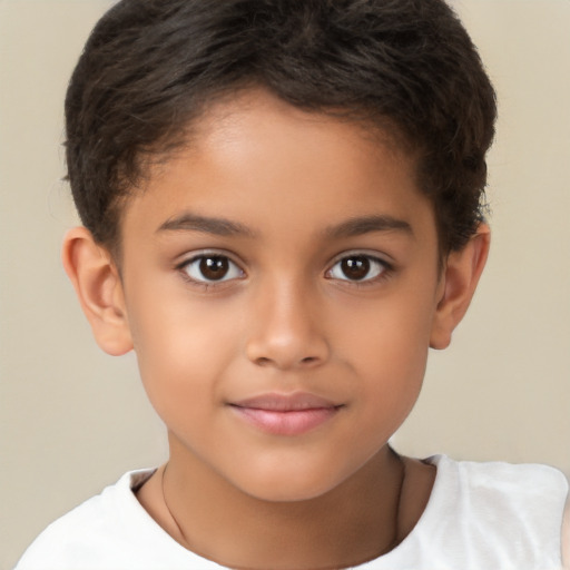 Joyful white child female with short  brown hair and brown eyes