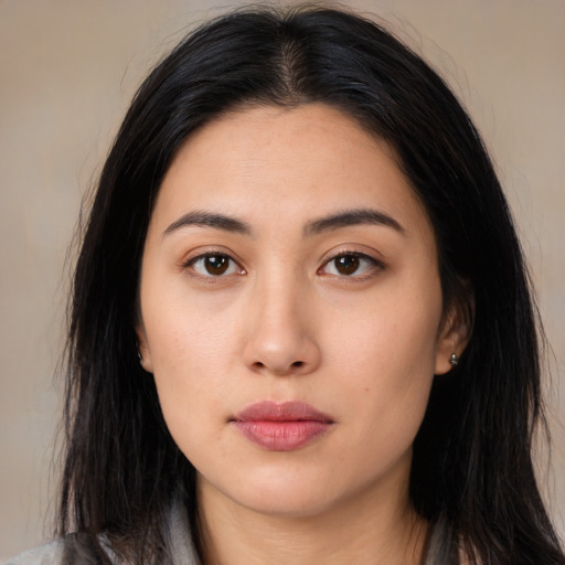 Neutral latino young-adult female with long  brown hair and brown eyes
