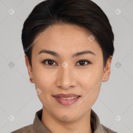 Joyful asian young-adult female with short  brown hair and brown eyes