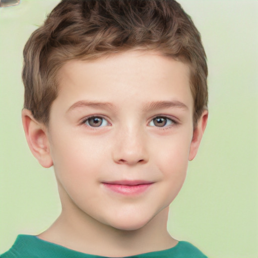 Joyful white child male with short  brown hair and brown eyes