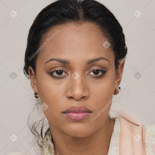 Joyful latino young-adult female with long  brown hair and brown eyes