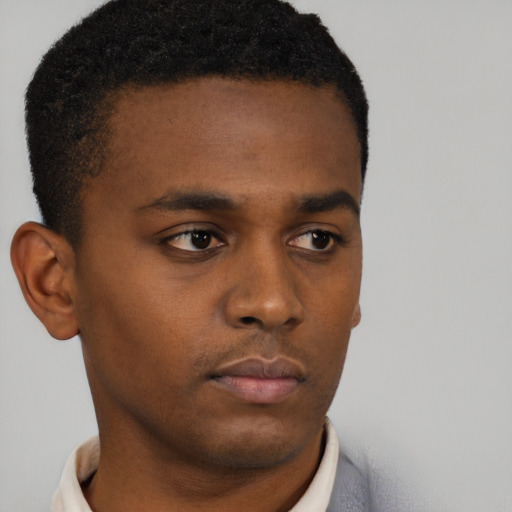 Neutral black young-adult male with short  brown hair and brown eyes