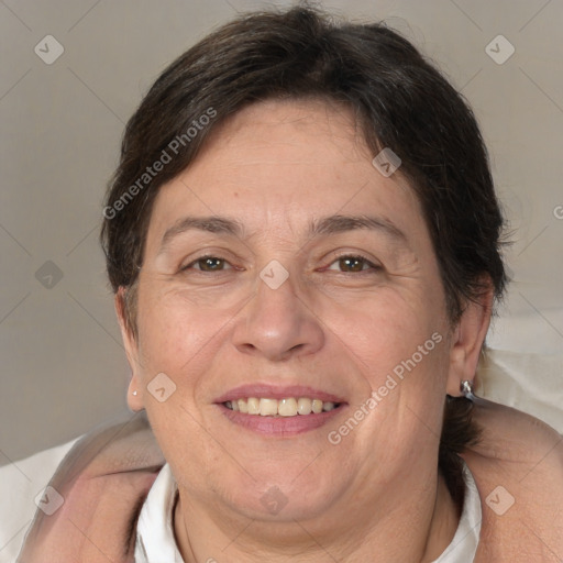 Joyful white adult female with short  brown hair and brown eyes