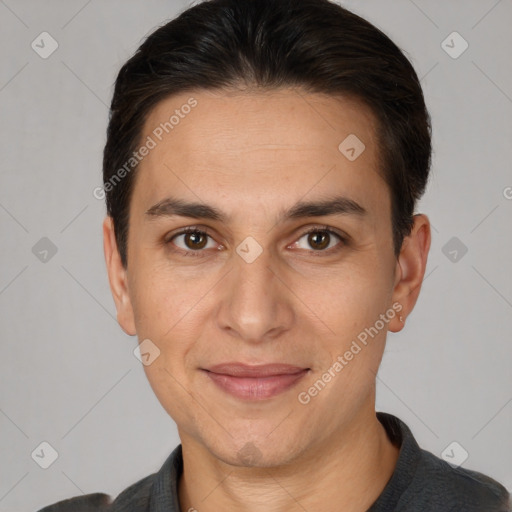 Joyful white adult male with short  brown hair and brown eyes