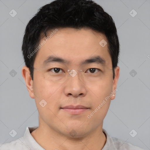 Neutral asian young-adult male with short  black hair and brown eyes