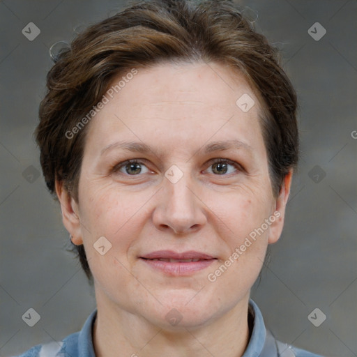 Joyful white adult female with short  brown hair and brown eyes