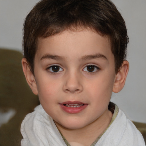 Joyful white child male with short  brown hair and brown eyes