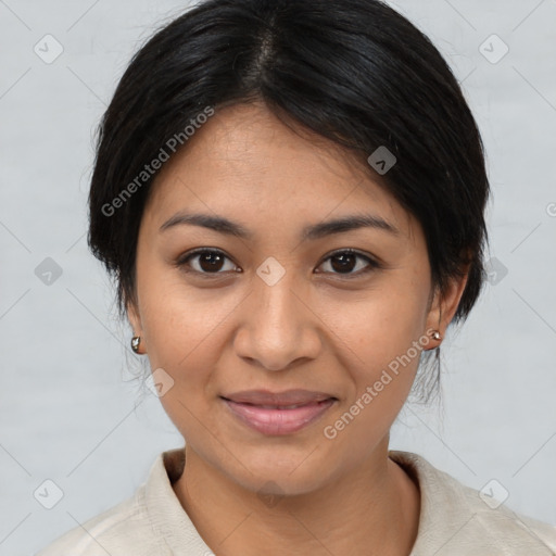 Joyful asian young-adult female with medium  black hair and brown eyes