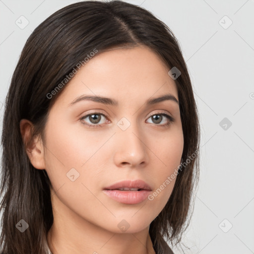 Neutral white young-adult female with long  brown hair and brown eyes