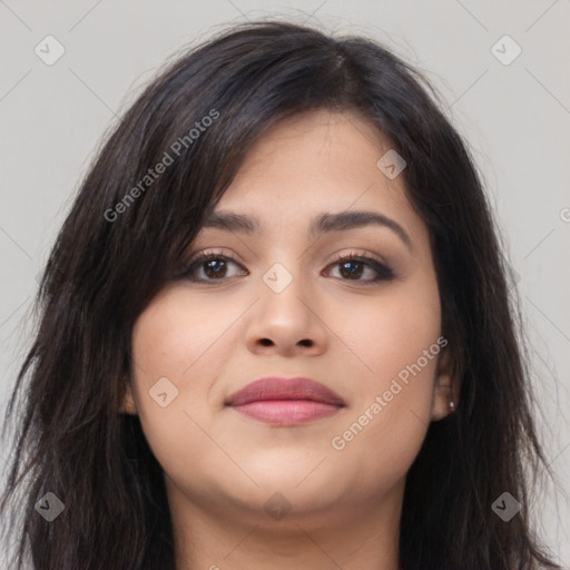 Joyful asian young-adult female with long  brown hair and brown eyes