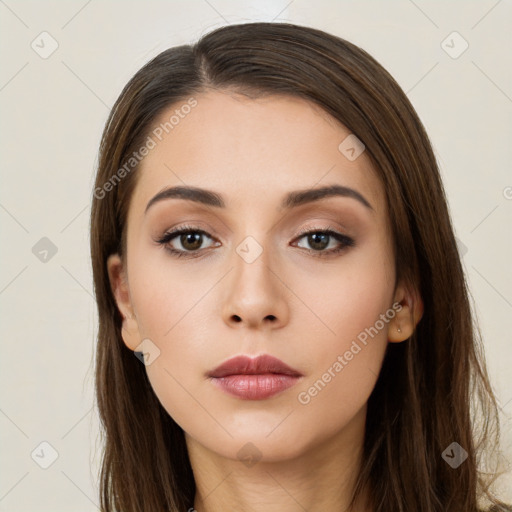 Neutral white young-adult female with long  brown hair and brown eyes