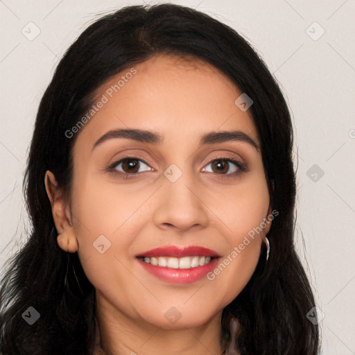 Joyful white young-adult female with long  black hair and brown eyes