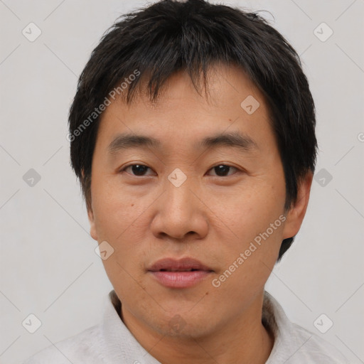 Neutral asian young-adult male with short  black hair and brown eyes