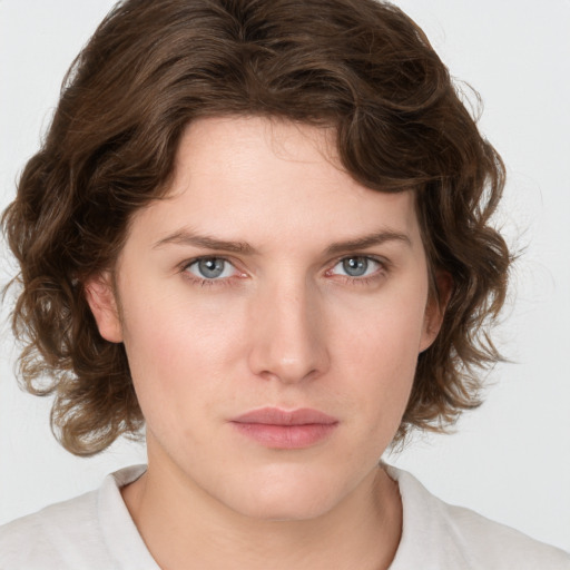 Neutral white young-adult female with medium  brown hair and blue eyes