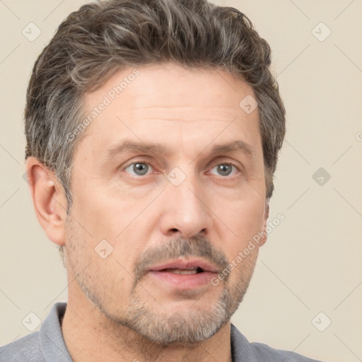 Neutral white adult male with short  brown hair and brown eyes