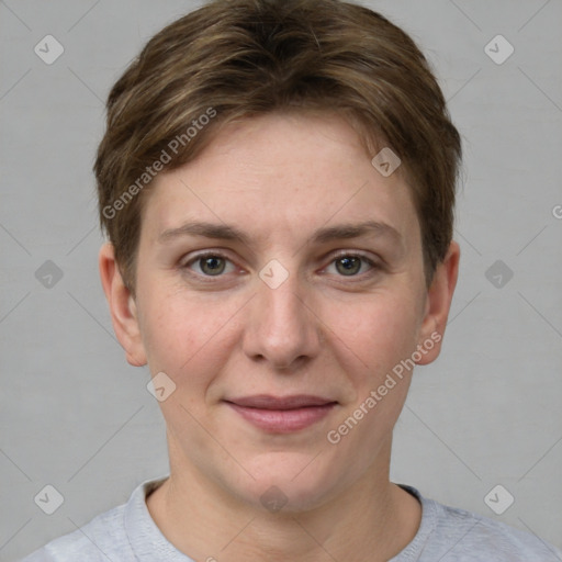 Joyful white young-adult female with short  brown hair and grey eyes