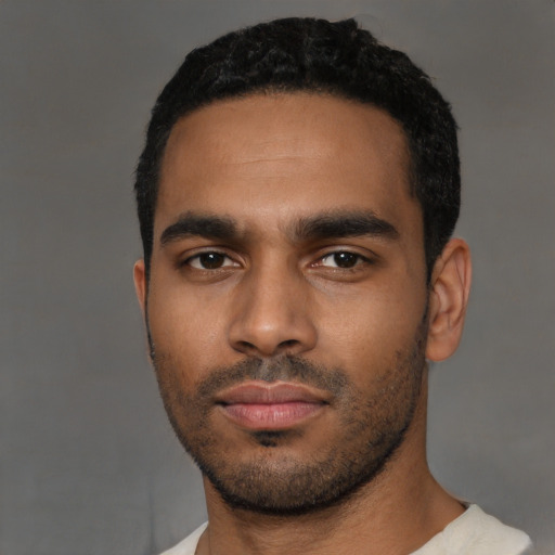 Neutral latino young-adult male with short  black hair and brown eyes
