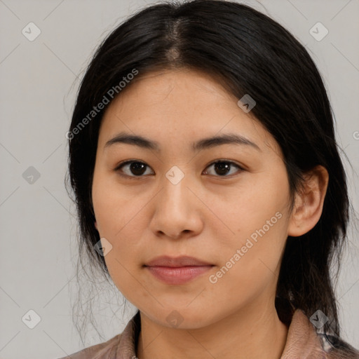 Joyful asian young-adult female with medium  black hair and brown eyes