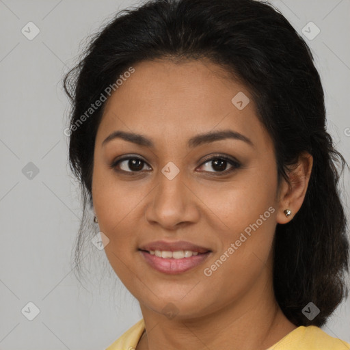 Joyful latino young-adult female with medium  brown hair and brown eyes