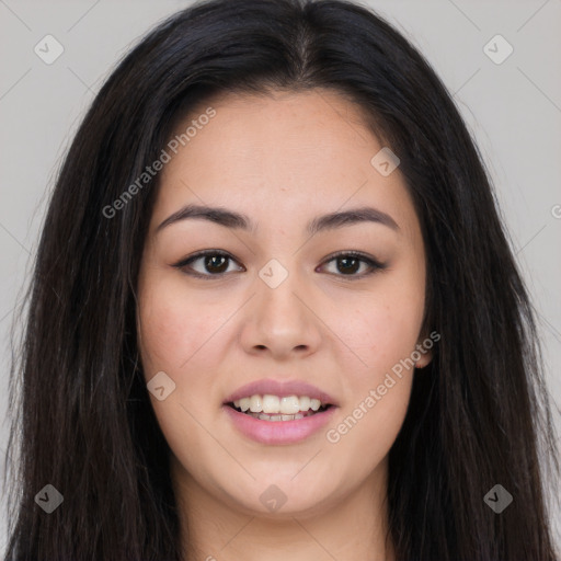 Joyful asian young-adult female with long  brown hair and brown eyes