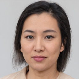 Neutral asian young-adult female with medium  brown hair and brown eyes