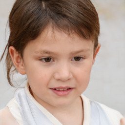 Joyful white child male with short  brown hair and brown eyes