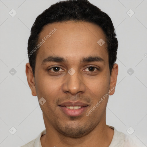 Joyful latino young-adult male with short  black hair and brown eyes